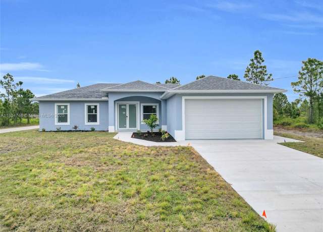 Property at 935 Elgin St, Lehigh Acres, FL 33974, 3 beds, 2 baths