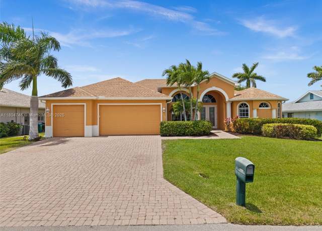 Property at 1702 SE 6th Ave, Cape Coral, FL 33990, 4 beds, 3.5 baths
