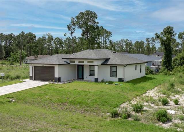 Property at 928 Milwaukee Blvd, Lehigh Acres, FL 33974, 4 beds, 2 baths