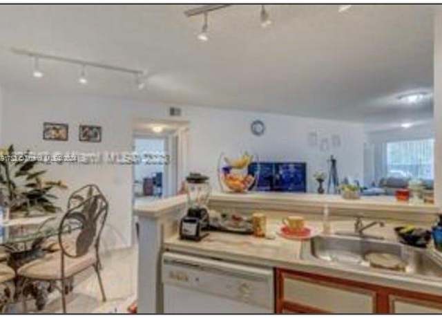 Property at 1401 Village Blvd #211, West Palm Beach, FL 33409, 2 beds, 1 bath