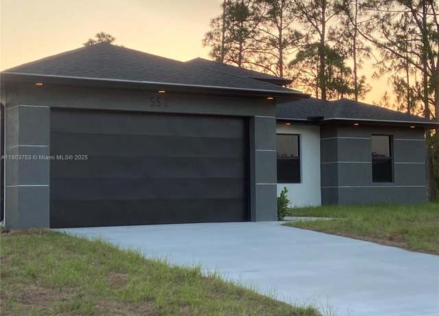 Property at 552 Cottonwood Ave S, Lehigh Acres, FL 33974, 4 beds, 3 baths