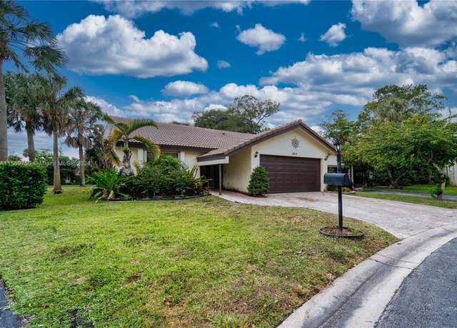 Property at 1410 Riverwood Ln, Coral Springs, FL 33071, 3 beds, 2 baths