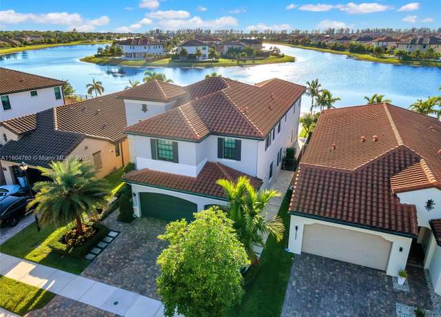 Property at 8575 Baypoint Cir, Parkland, FL 33076, 5 beds, 4 baths