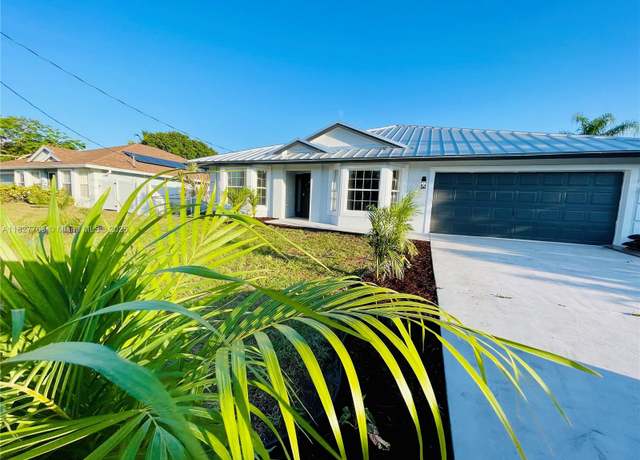 Property at 272 SW Oakridge Dr, Port St. Lucie, FL 34984, 4 beds, 2 baths