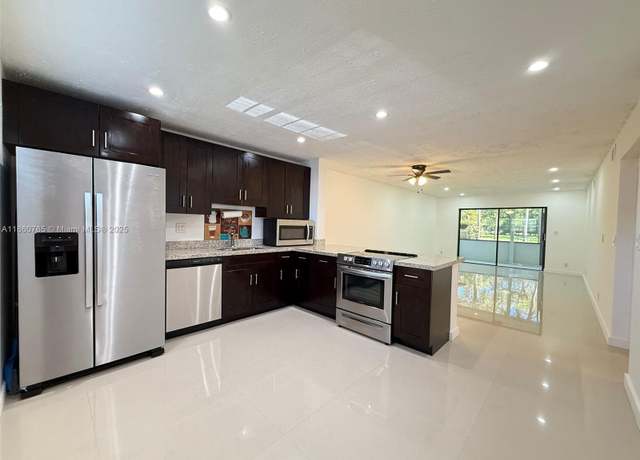 Property at 6095 N Sabal Palm Blvd #103, Tamarac, FL 33319, 2 beds, 2 baths