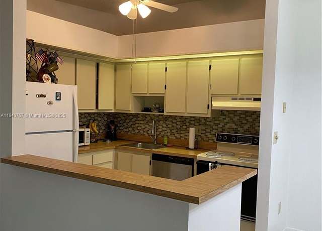 Property at 10407 E Clairmont Cir #210, Tamarac, FL 33321, 2 beds, 1 bath