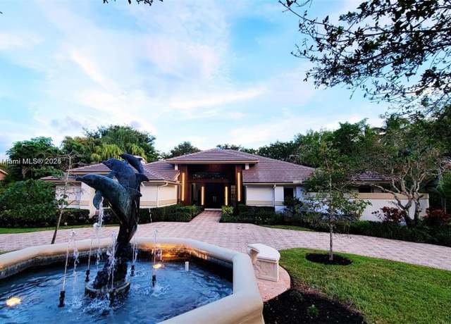 Property at 7700 S Woodridge Dr, Parkland, FL 33067, 6 beds, 7.5 baths