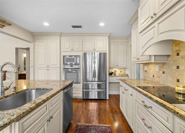 Property at 8800 N Bayshore Dr, Miami, FL 33138, 3 beds, 2 baths