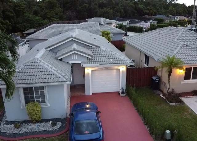Property at 13949 SW 150th Ct, Miami, FL 33196, 3 beds, 2 baths