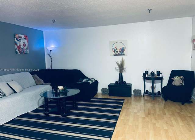Property at 671 NE 195th St Unit 207-E, Miami, FL 33179, 1 bed, 1.5 baths