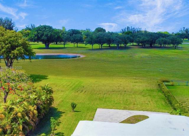 Property at 1025 Hunting Lodge Dr, Miami Springs, FL 33166, 2 beds, 2.5 baths