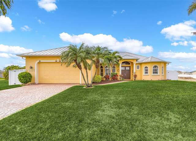 Property at 1004 NW 33rd Ave, Cape Coral, FL 33993, 3 beds, 3 baths