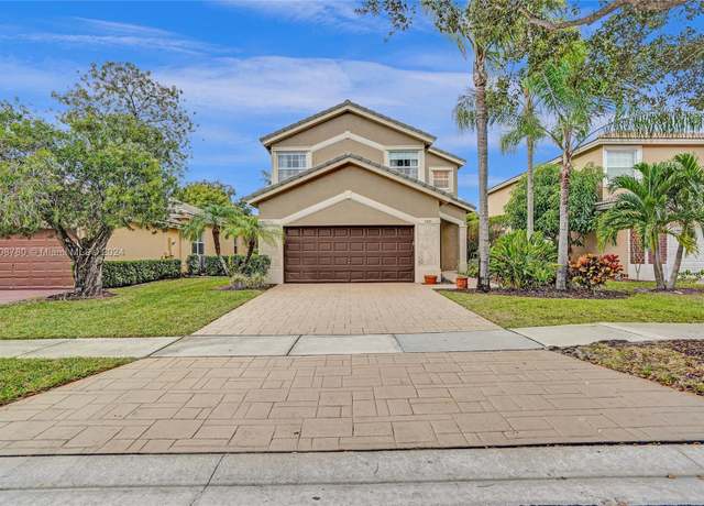 Property at 7673 NW 70th Ave, Parkland, FL 33067, 4 beds, 2.5 baths