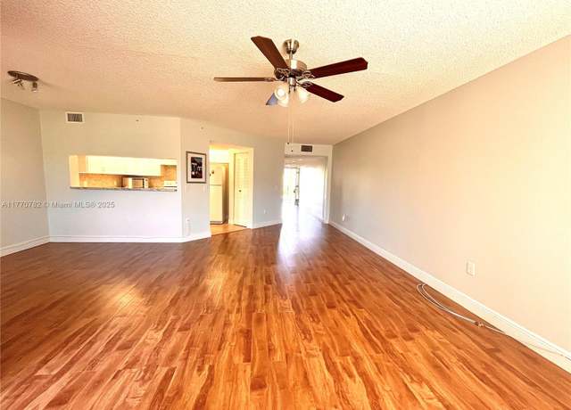 Property at 12550 SW 15th St Unit 210E, Pembroke Pines, FL 33027, 1 bed, 1.5 baths