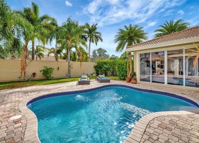 Property at 5865 NW 125th Ave, Coral Springs, FL 33076, 4 beds, 3 baths
