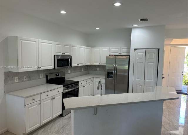Property at 1990 Marsh Harbor Dr, Riviera Beach, FL 33404, 3 beds, 2.5 baths