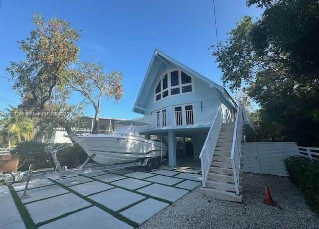 Property at 202 Mahogany Dr, Key Largo, FL 33037, 4 beds, 3 baths