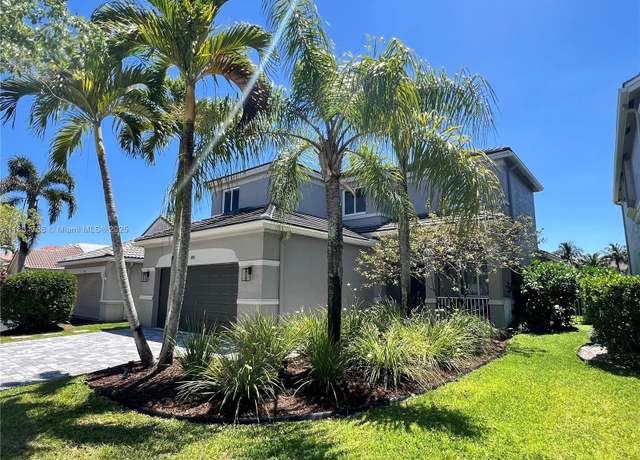 Property at 1192 Chinaberry Dr, Weston, FL 33327, 4 beds, 3.5 baths
