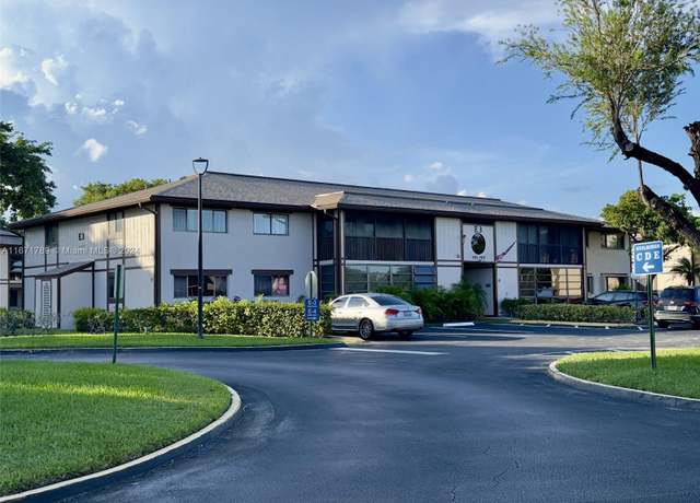 Property at 9889 N Belfort Cir #211, Tamarac, FL 33321, 3 beds, 2 baths