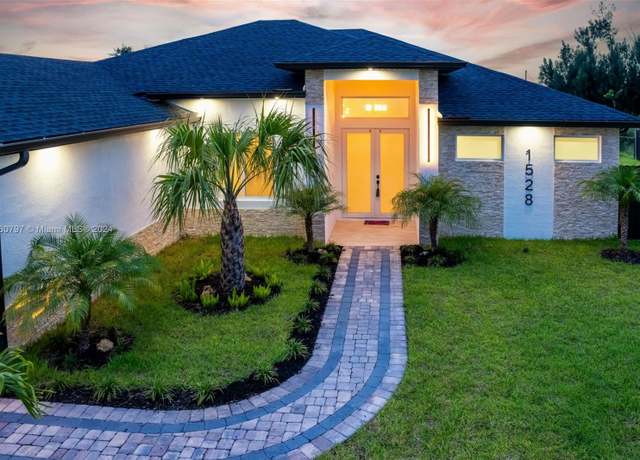 Property at 1528 SW 15th Ave, Cape Coral, FL 33991, 4 beds, 3 baths