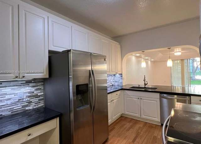 Property at 10710 NW 66th St #111, Doral, FL 33178, 3 beds, 2 baths