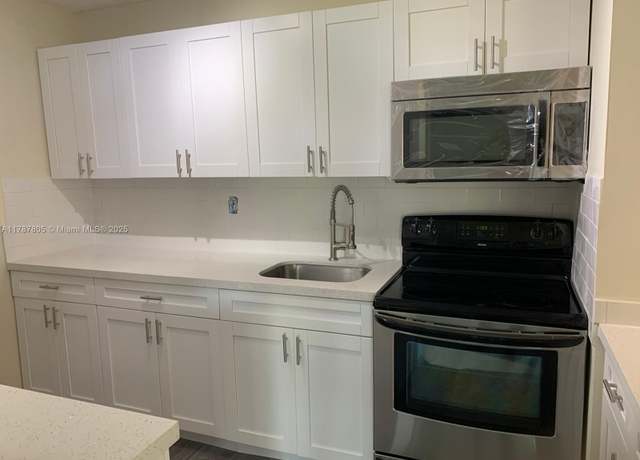 Property at 451 NE 207th Ln #102, Miami, FL 33179, 3 beds, 2 baths