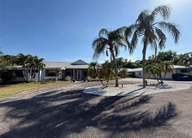 Property at 5584 SW Quail Hollow St, Palm City, FL 34990, 5 beds, 4.5 baths