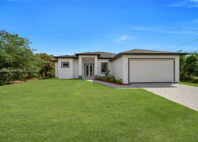 Property at 516 Millcreek St, Lehigh Acres, FL 33974, 3 beds, 2 baths