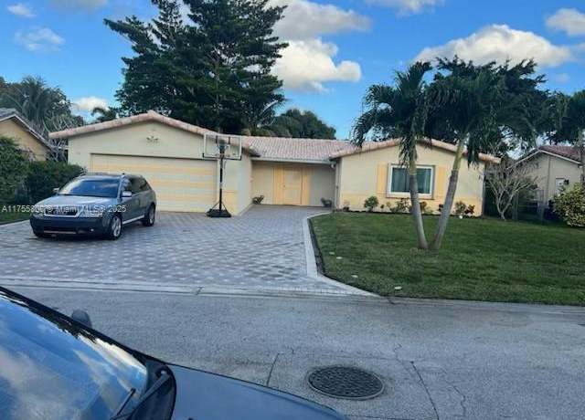 Property at 3971 NW 109th Ave, Coral Springs, FL 33065, 4 beds, 2 baths