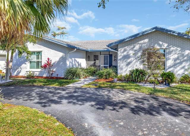 Property at 7106 NW 107th Ave, Tamarac, FL 33321, 3 beds, 2 baths