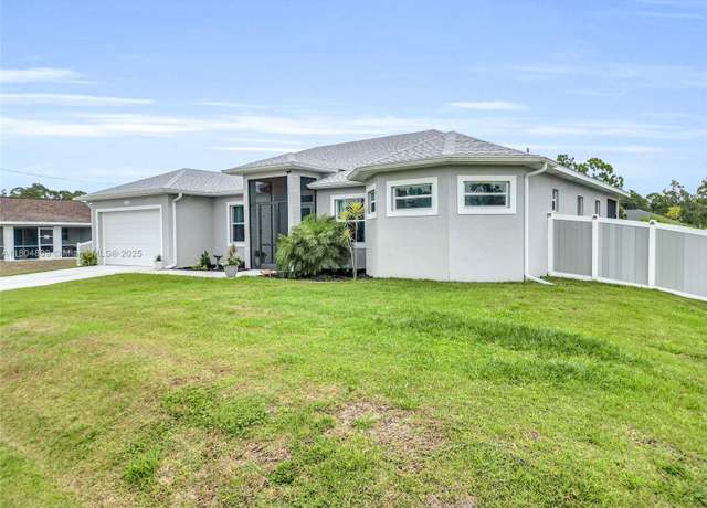 Property at 1020 Rush Ave, Lehigh Acres, FL 33972, 3 beds, 2 baths