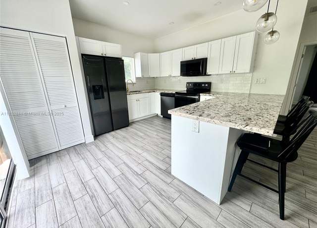 Property at 1001 NW 63rd St, Miami, FL 33150, 3 beds, 2 baths