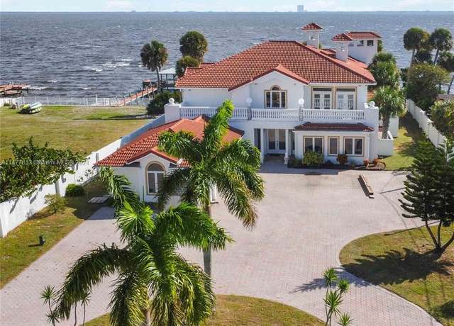 Property at 3415 S Washington, Titusville, FL 32780, 5 beds, 4.5 baths