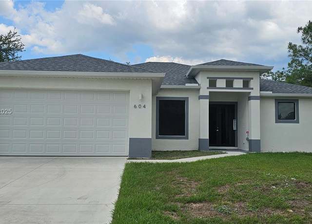 Property at 604 Lake Ave, Lehigh Acres, FL 33972, 3 beds, 2.5 baths