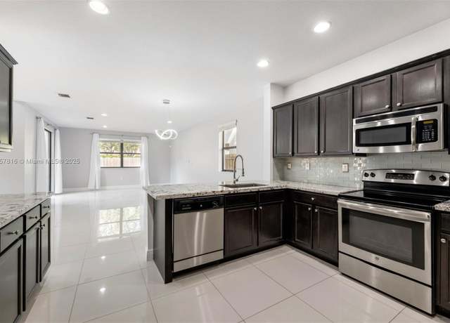 Property at 602 SE 33rd Ter, Homestead, FL 33033, 3 beds, 2.5 baths