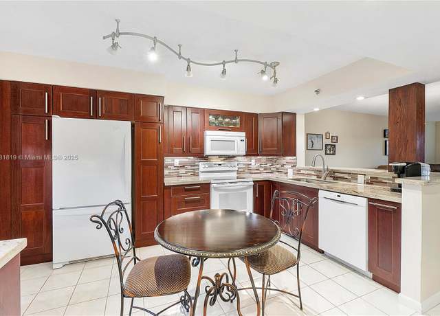 Property at 2200 S Cypress Bend Dr #406, Pompano Beach, FL 33069, 2 beds, 2 baths