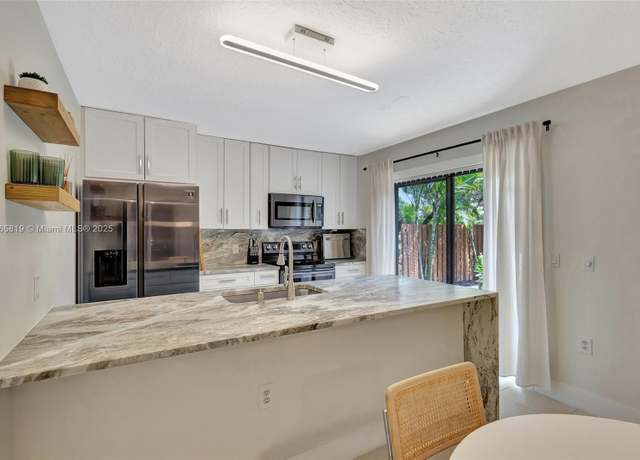 Property at 206 Charter Way #206, West Palm Beach, FL 33407, 2 beds, 2.5 baths