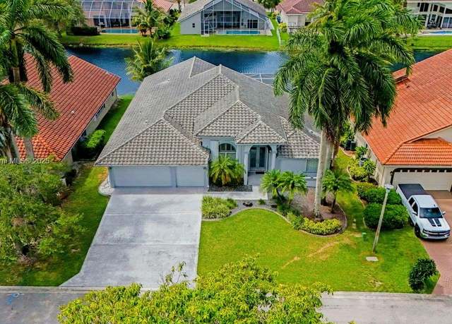 Property at 9912 NW 49th Pl, Coral Springs, FL 33076, 4 beds, 2.5 baths