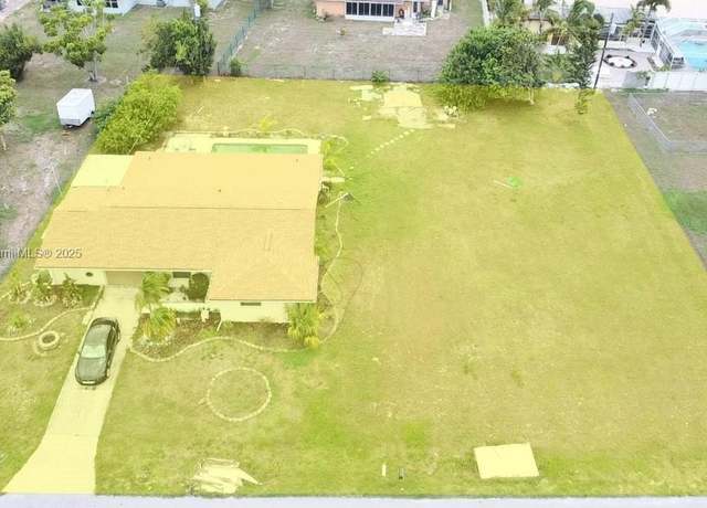 Property at 156 Francis Dr NE, Port Charlotte, FL 33952, 3 beds, 3 baths