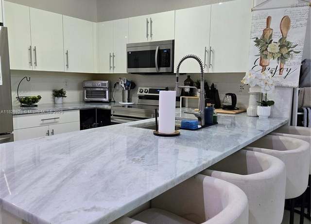Property at 8216 W Santa Monica Ave, Tamarac, FL 33321, 3 beds, 2.5 baths