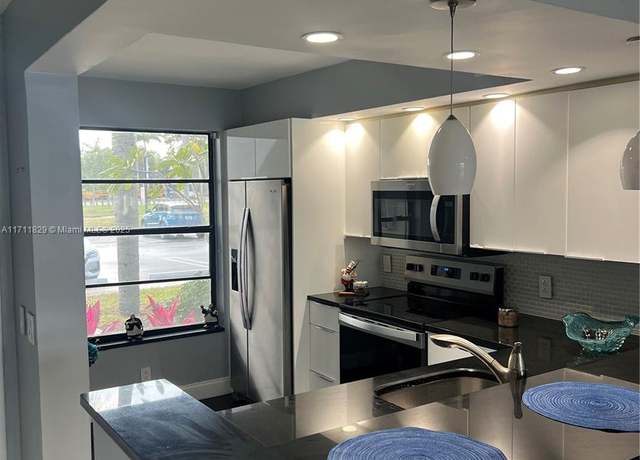 Property at 202 Lake Pointe Dr #107, Oakland Park, FL 33309, 2 beds, 2 baths