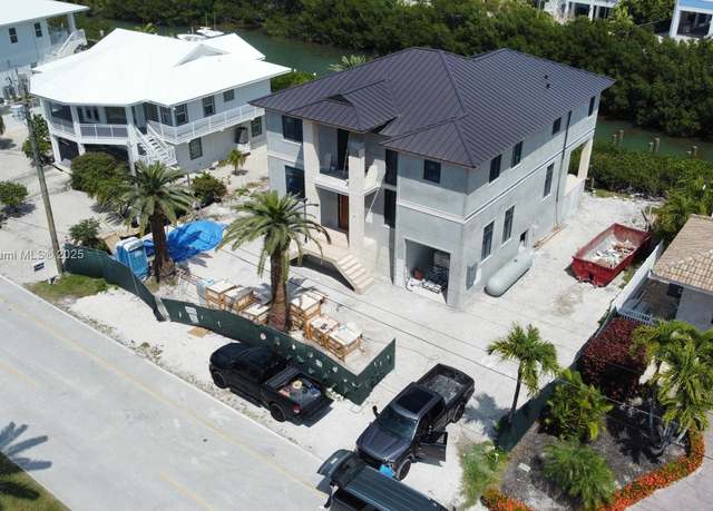 Property at 230 15th Cir, Key Colony, FL 33051, 5 beds, 4 baths