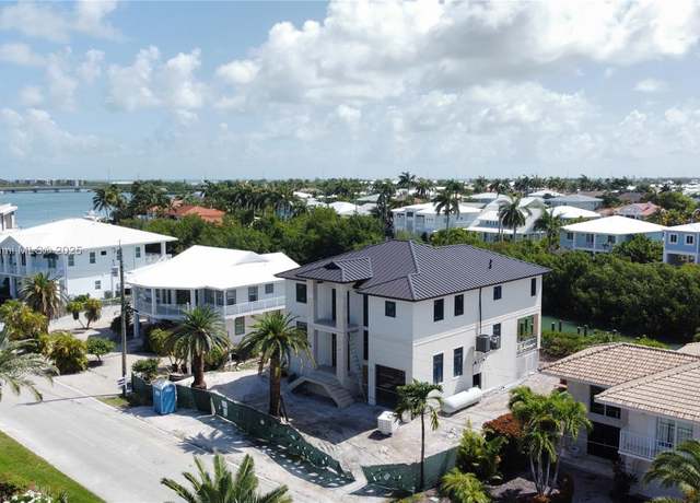 Property at 230 15th Cir, Key Colony, FL 33051, 5 beds, 4 baths