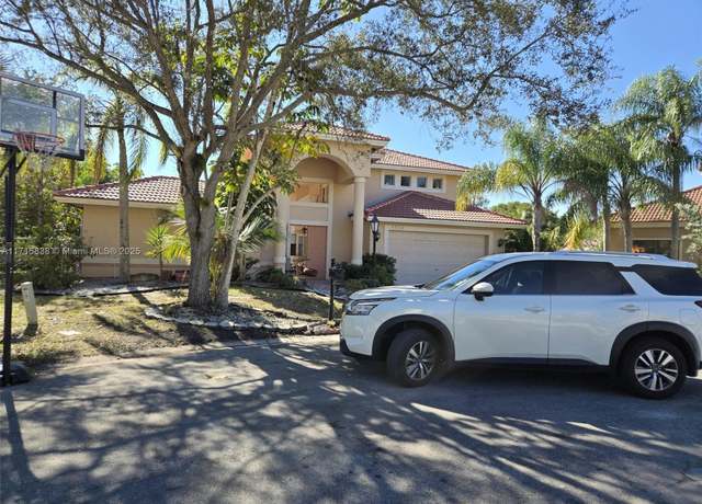 Property at 4956 Rothschild Dr, Coral Springs, FL 33067, 5 beds, 4 baths