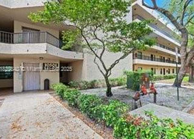 Property at 10501 W Broward Blvd #407, Plantation, FL 33324, 2 beds, 2 baths