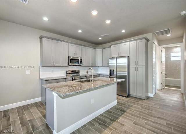 Property at 6013 N Gene Ave, Lehigh Acres, FL 33971, 3 beds, 2 baths
