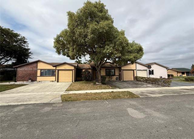 Property at 9751 W Daffodil Ln, Miramar, FL 33025, 3 beds, 2 baths