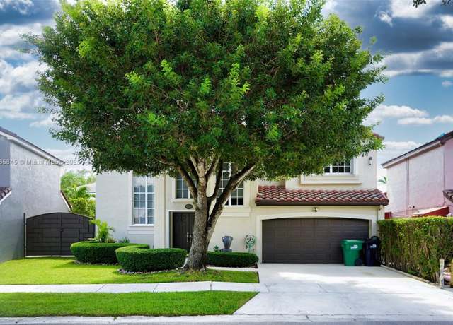 Property at 9725 SW 155th Ct, Miami, FL 33196, 3 beds, 2.5 baths
