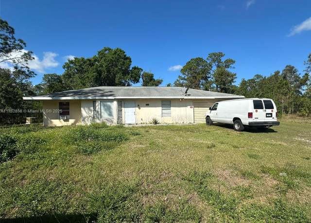 Property at 909 Canton Ave, Lehigh Acres, FL 33972, 2 beds, 3 baths