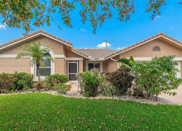 Property at 7105 NW 45th St, Coral Springs, FL 33065, 4 beds, 2 baths